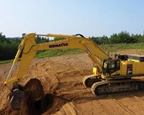 New Komatsu Excavator working in the field